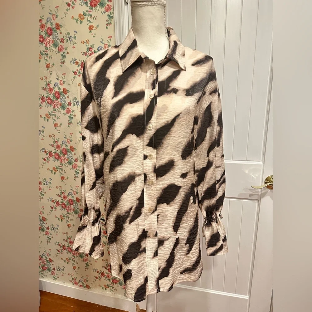 Black and cream zebra print button up blouse with tie at wrist and ruffle cuff - Picture 2 of 7